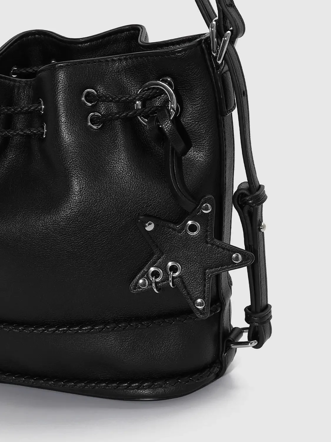 19260-textured-shell-tassel-detail-compact-backpack-4.webp Textured Shell Tassel Detail Compact Backpack