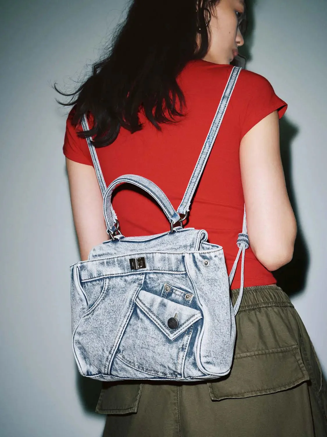 19306-vintage-washed-denim-handle-front-pocket-backpack-2.webp Vintage Washed Denim Handle Front Pocket Backpack