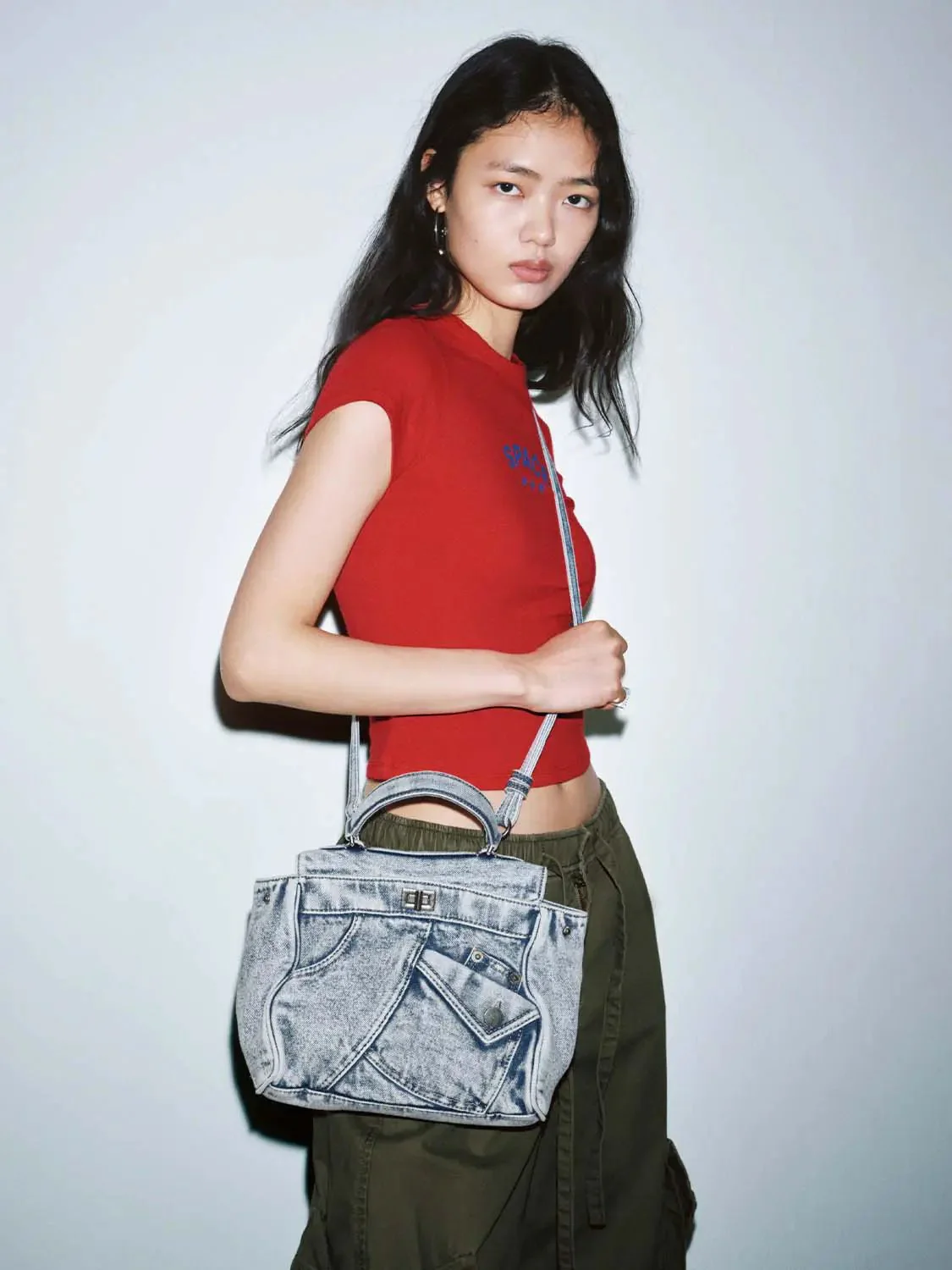 19306-vintage-washed-denim-handle-front-pocket-backpack-4.webp Vintage Washed Denim Handle Front Pocket Backpack