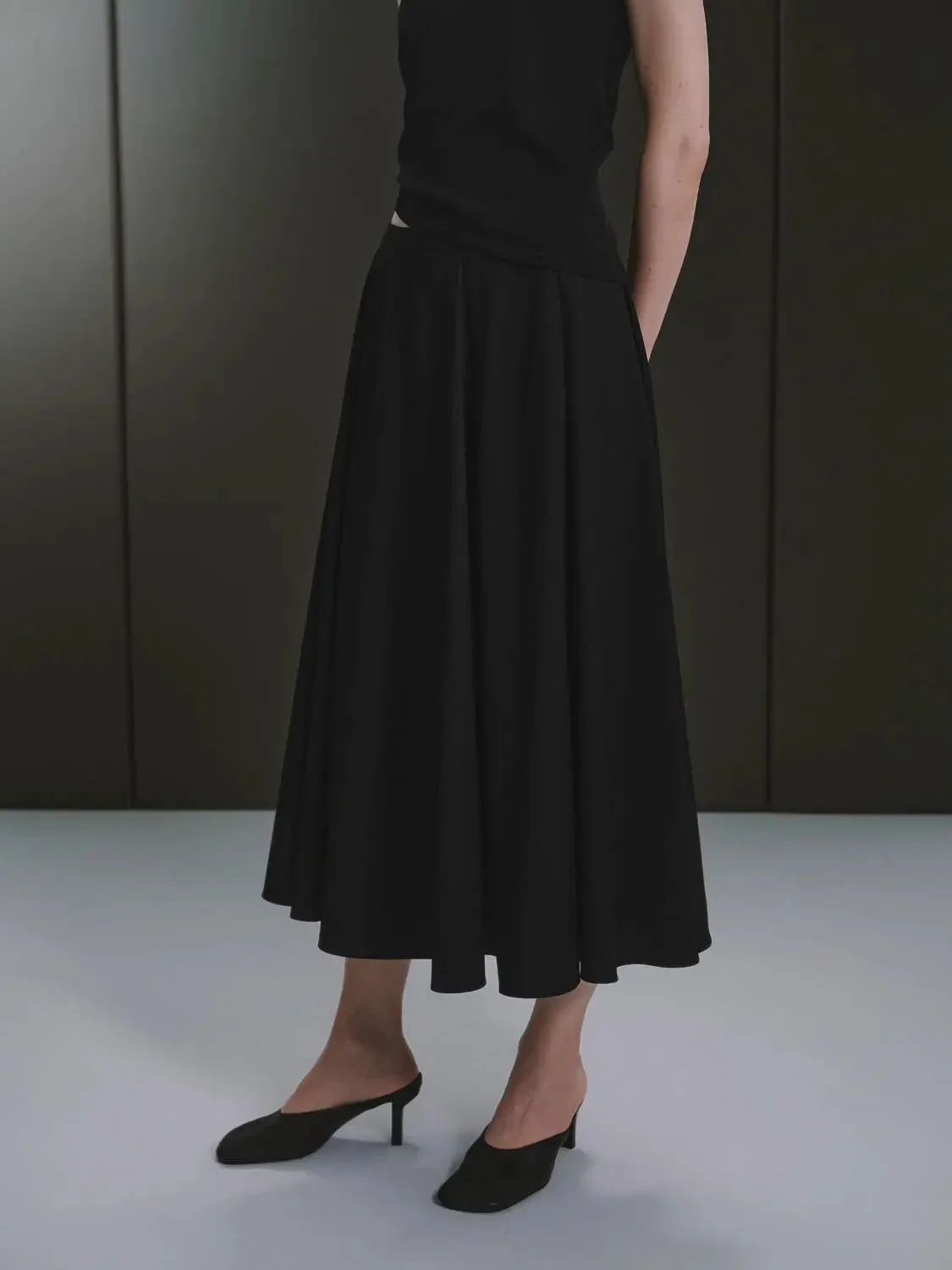 19348-timeless-pleated-a-line-midi-silhouette-skirt-3.webp Timeless Pleated A Line Midi Silhouette Skirt