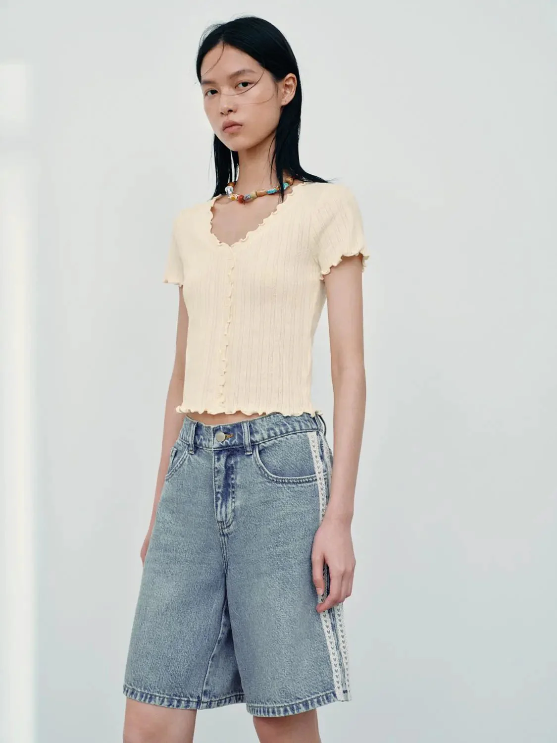 19355-ruffle-trim-cotton-button-detail-t-shirt-2.webp Ruffle Trim Cotton Button Detail T Shirt