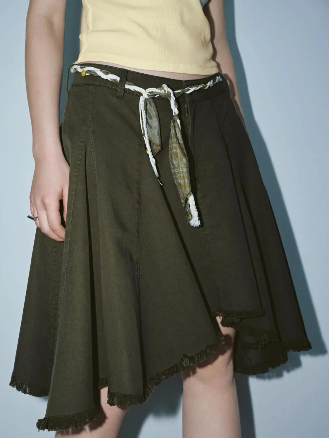 1953-string-belt-pleated-raw-hem-a-line-mini-skirts-5.webp String Belt Pleated Raw Hem A-Line Mini Skirts