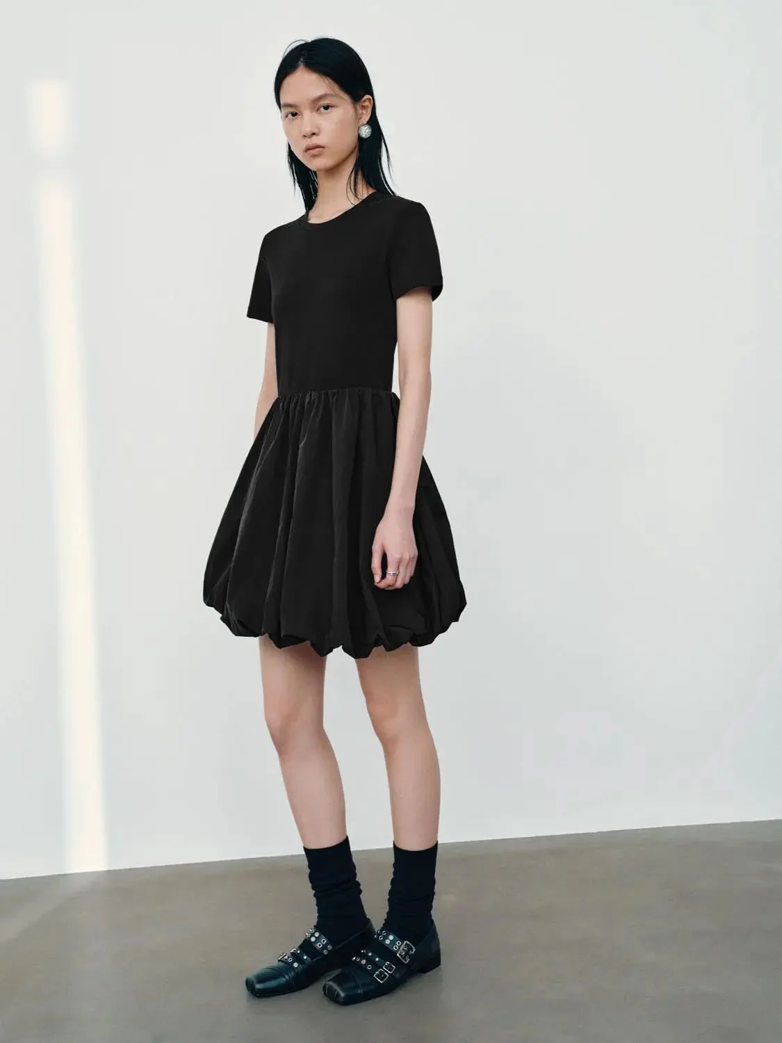 19628-black-cotton-knit-bubble-hem-skater-dresses-4.webp Black Cotton Knit Bubble Hem Skater Dresses