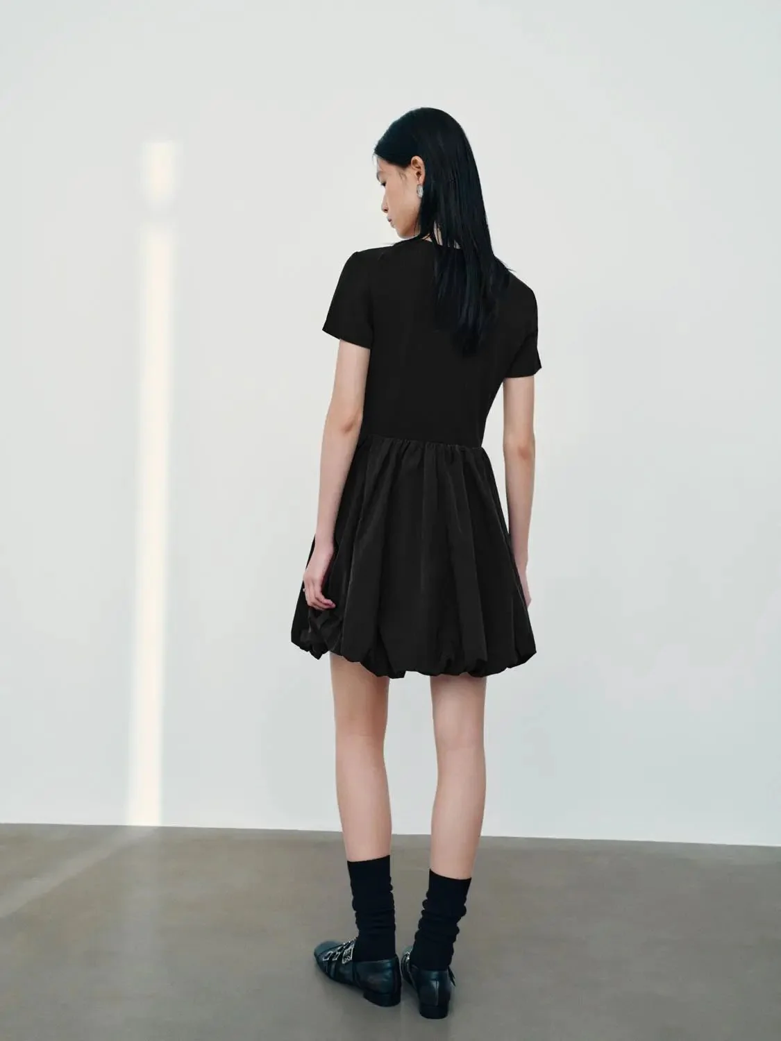19628-black-cotton-knit-bubble-hem-skater-dresses-6.webp Black Cotton Knit Bubble Hem Skater Dresses