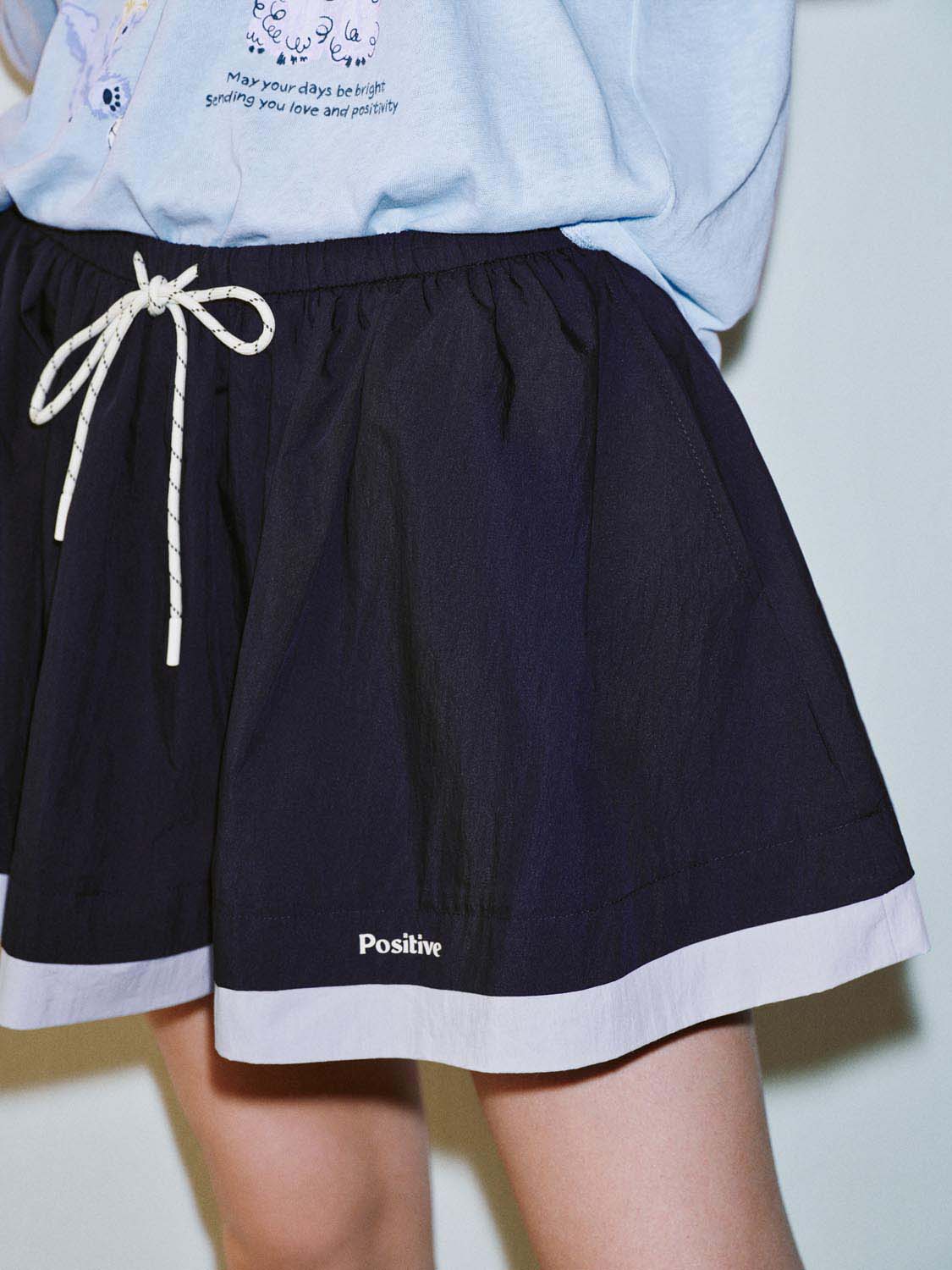 19789-contrast-hem-drawstring-pleated-mini-skirts-5.jpg Contrast Hem Drawstring Pleated Mini Skirts