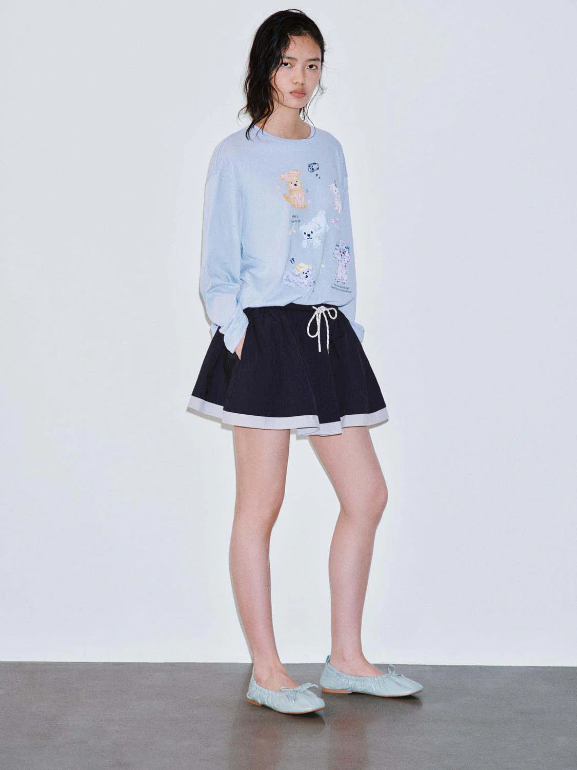 19789-contrast-hem-drawstring-pleated-mini-skirts-6.webp Contrast Hem Drawstring Pleated Mini Skirts