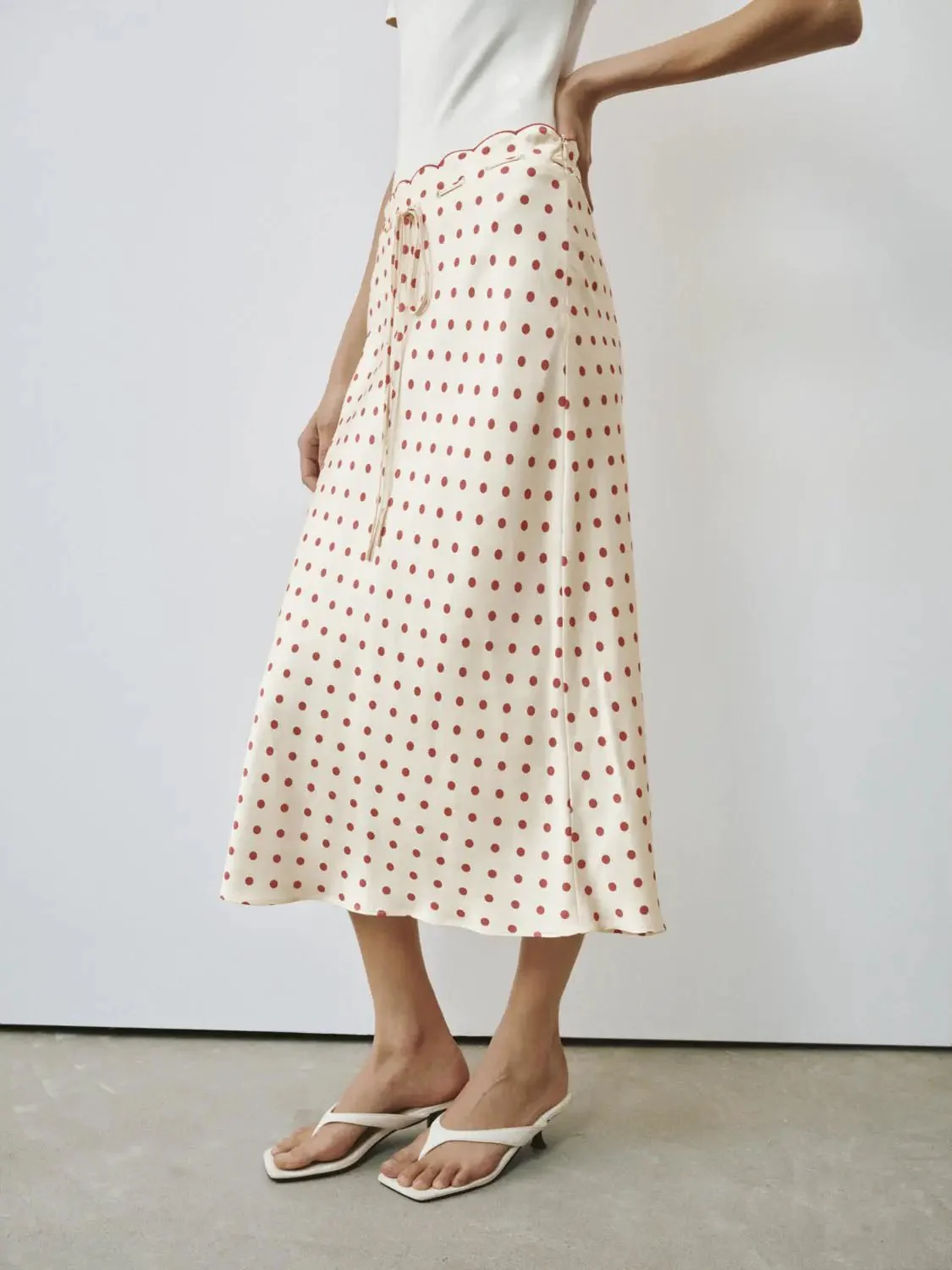 20000-polka-dotted-drawstring-fishtail-maxi-skirts-3.webp Polka Dotted Drawstring Fishtail Maxi Skirts