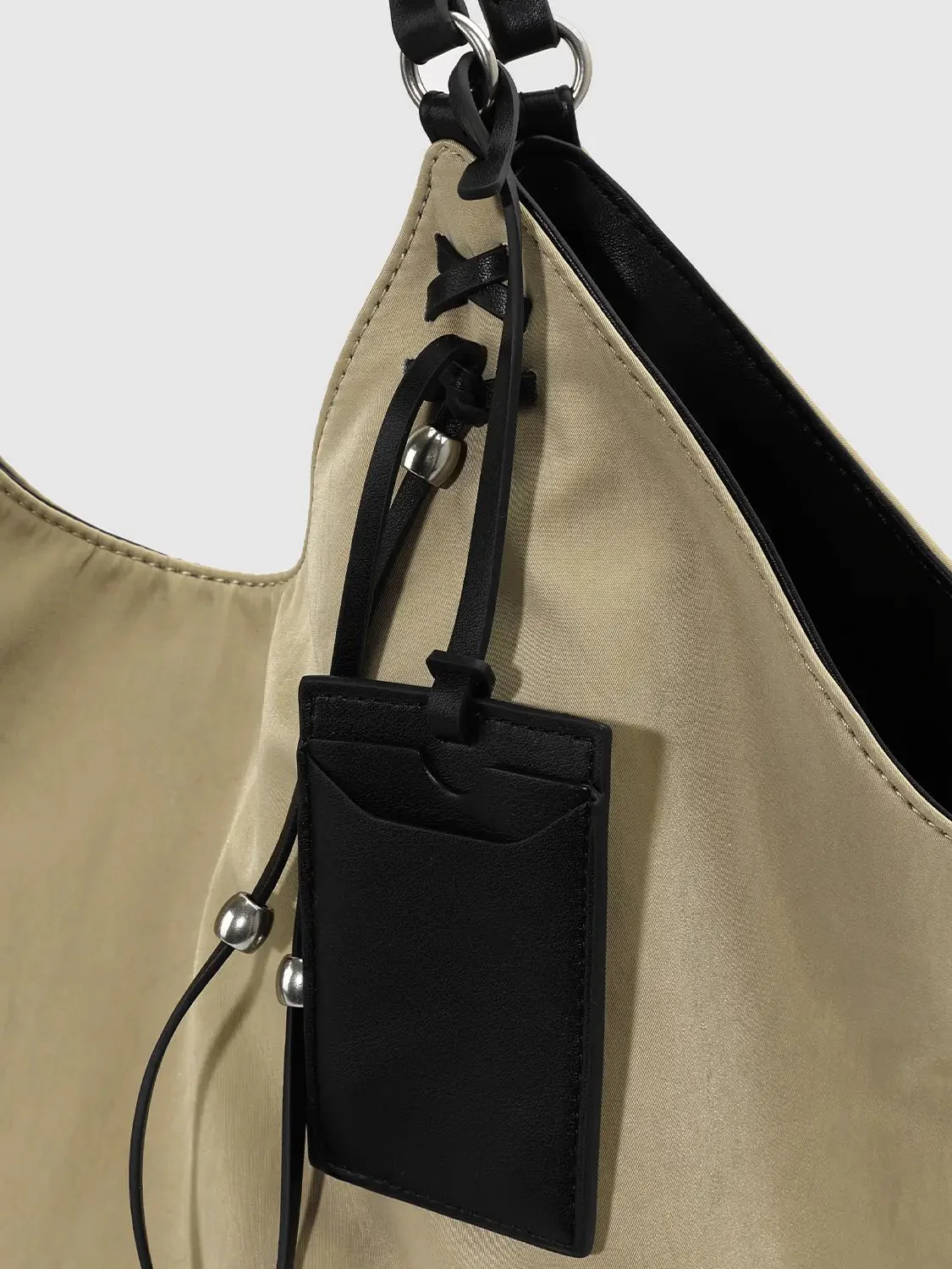 20291-oversize-string-detail-shoulder-bags-4.webp Oversize String Detail Shoulder Bags