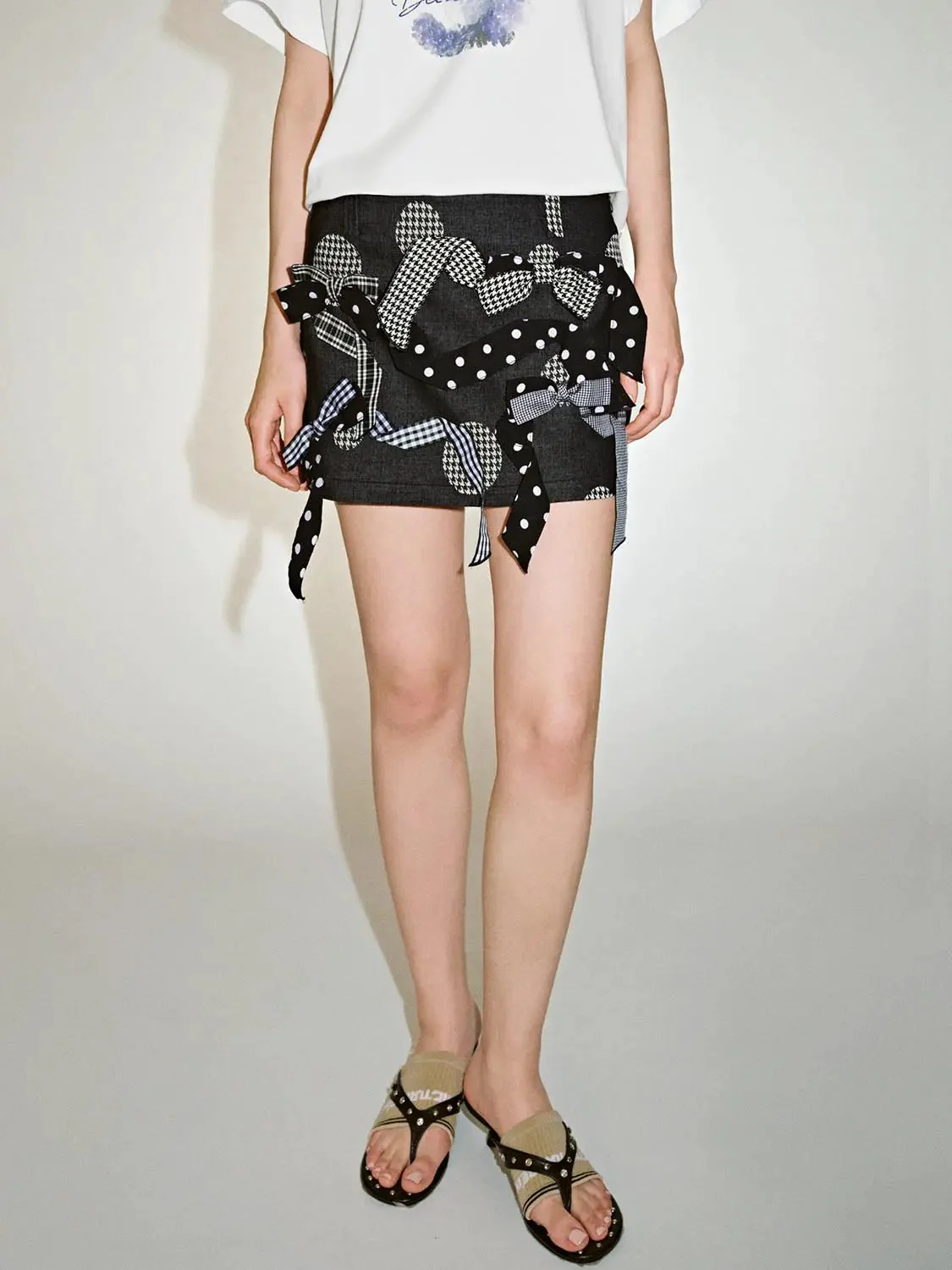 20474-bow-embellished-a-line-mini-skirts-1.webp Bow Embellished A-Line Mini Skirts