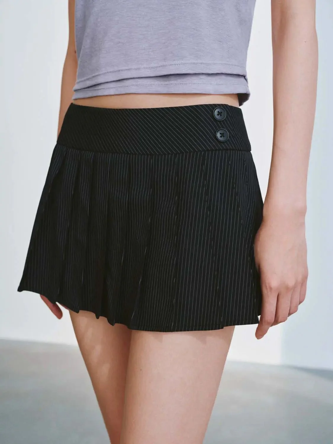 20580-pleated-a-line-mini-skirts-7.webp Pleated A-Line Mini Skirts