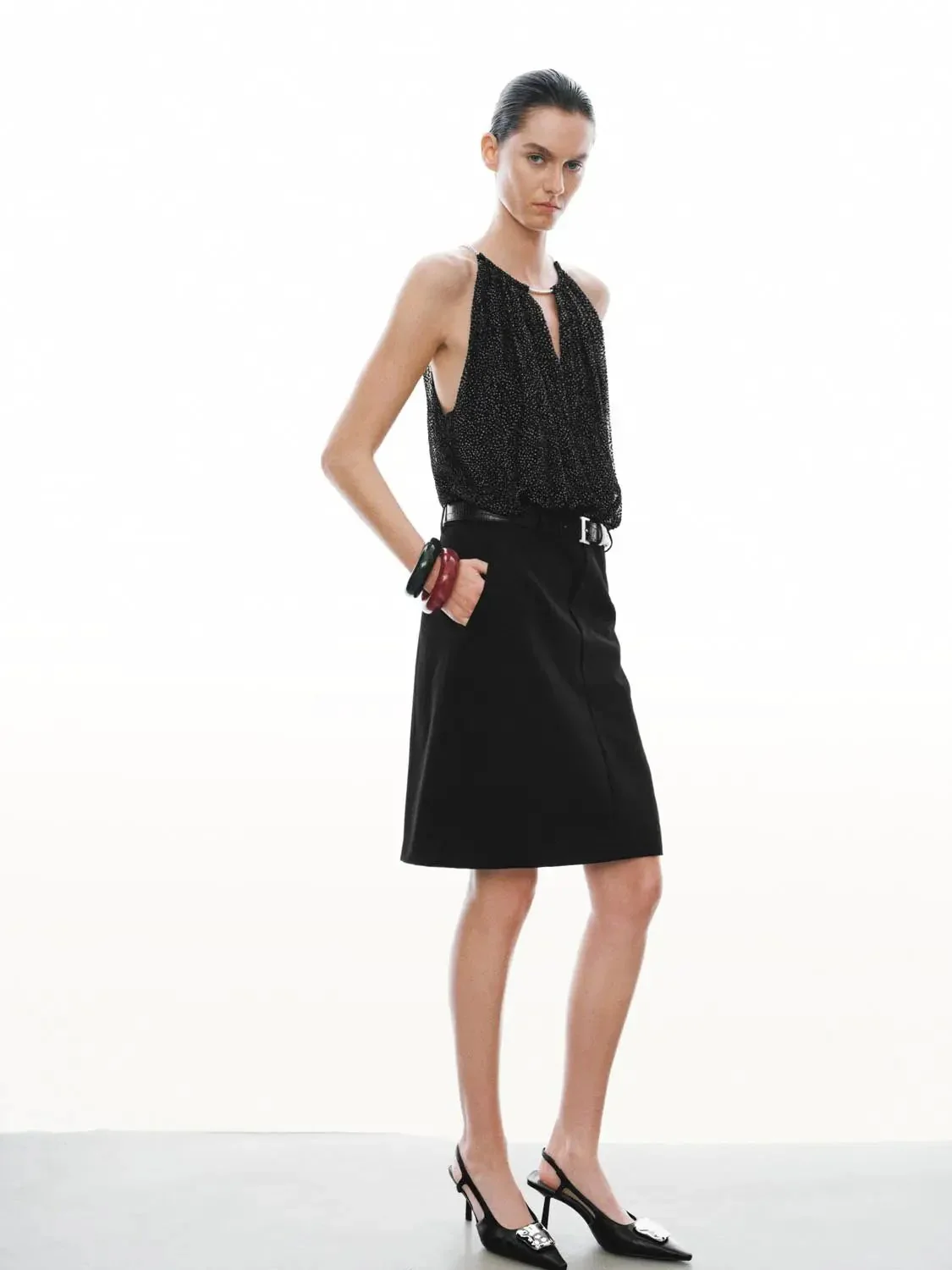 20586-dotted-halter-neck-sleeveless-straight-midi-dresses-4.webp Dotted Halter Neck Sleeveless Straight Midi Dresses