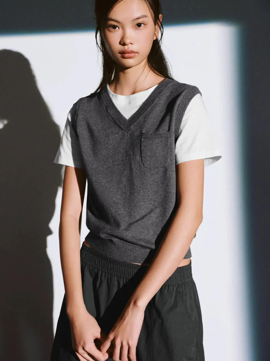 20599-cotton-knit-with-slim-v-neck-and-pocket-vest-3.webp Cotton Knit With Slim V-Neck And Pocket Vest