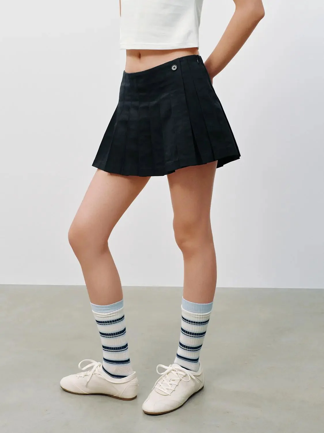 20776-pleated-a-line-mini-skirts-3.webp Pleated A-Line Mini Skirts
