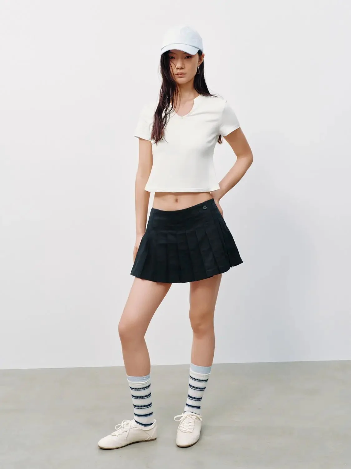 20776-pleated-a-line-mini-skirts-7.webp Pleated A-Line Mini Skirts