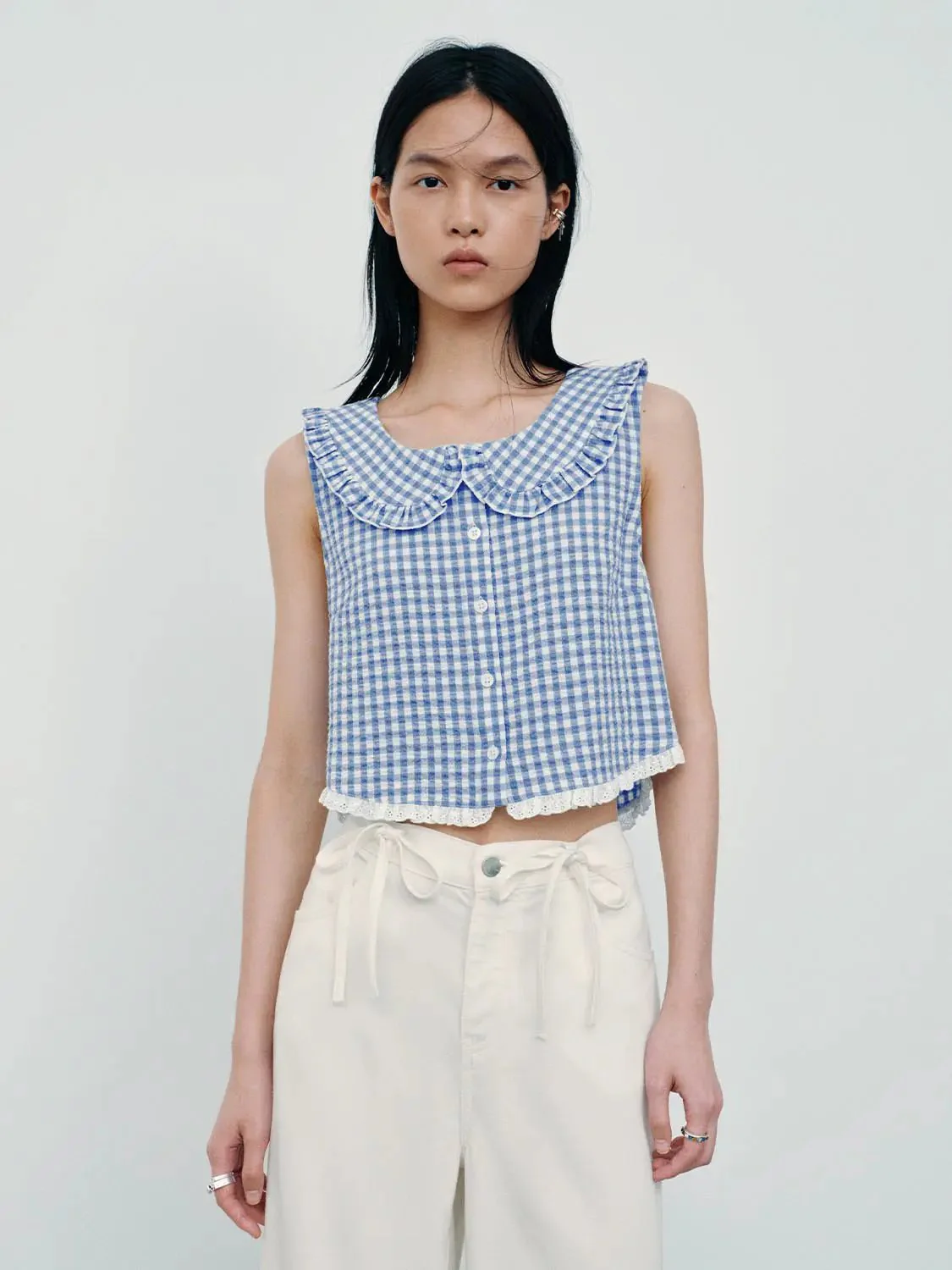 20907-contrast-check-ruffle-trim-sleeveless-shirts-1.webp Contrast Check Ruffle Trim Sleeveless Shirts