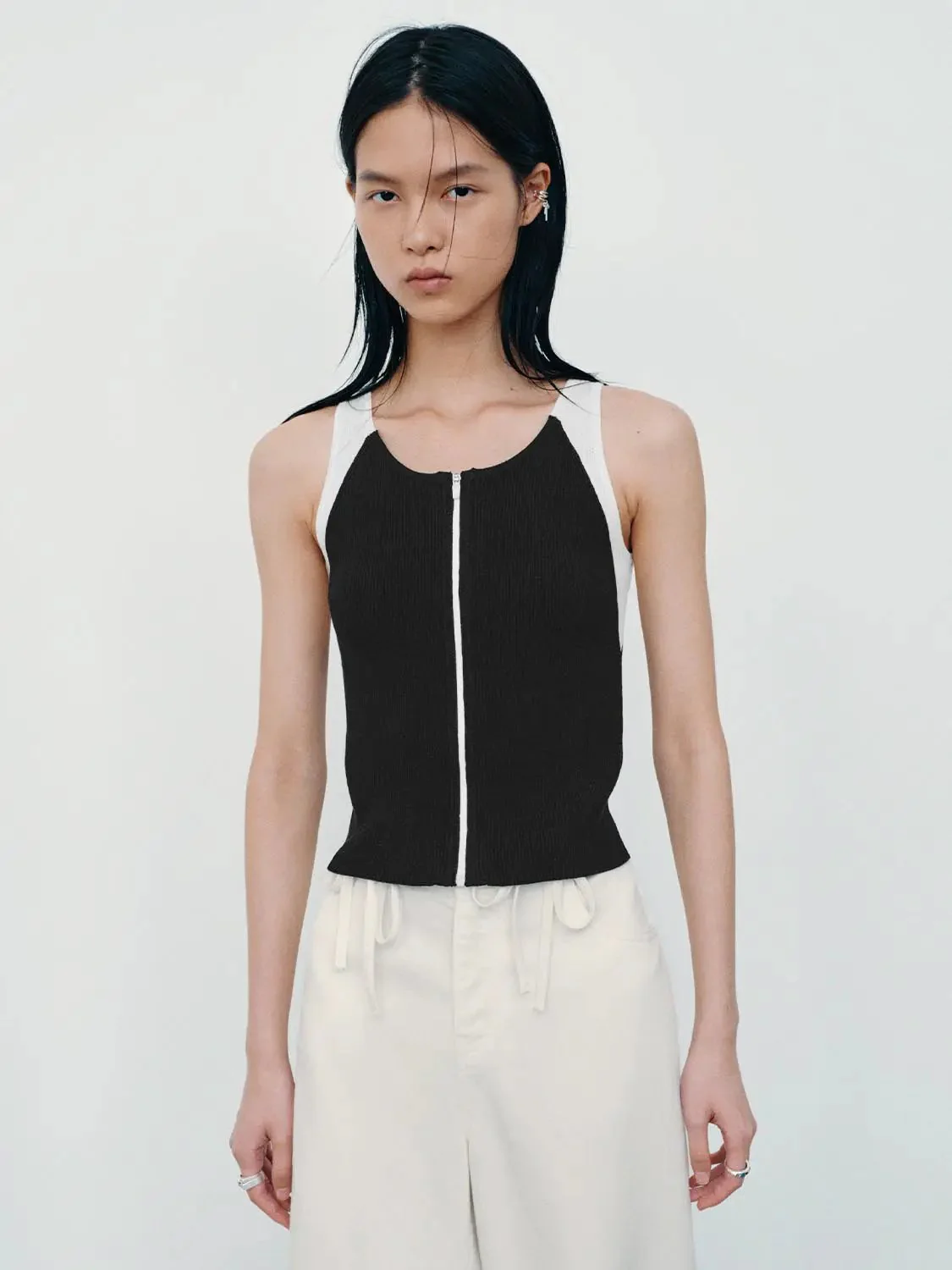 21039-zip-up-sleeveless-knitted-cardigans-9.webp Zip-Up Sleeveless Knitted Cardigans