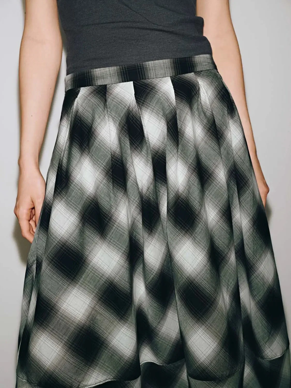 21188-check-pleated-a-line-midi-skirts-12.webp Check Pleated A-Line Midi Skirts