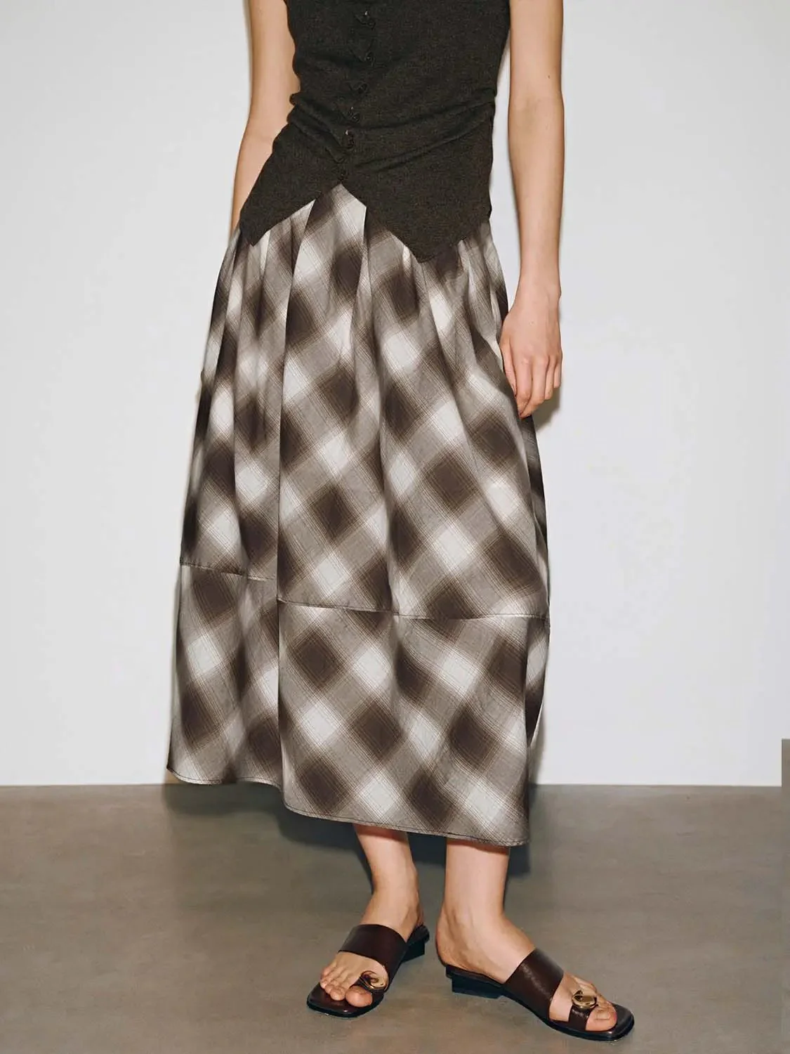 21188-check-pleated-a-line-midi-skirts-17.webp Check Pleated A-Line Midi Skirts