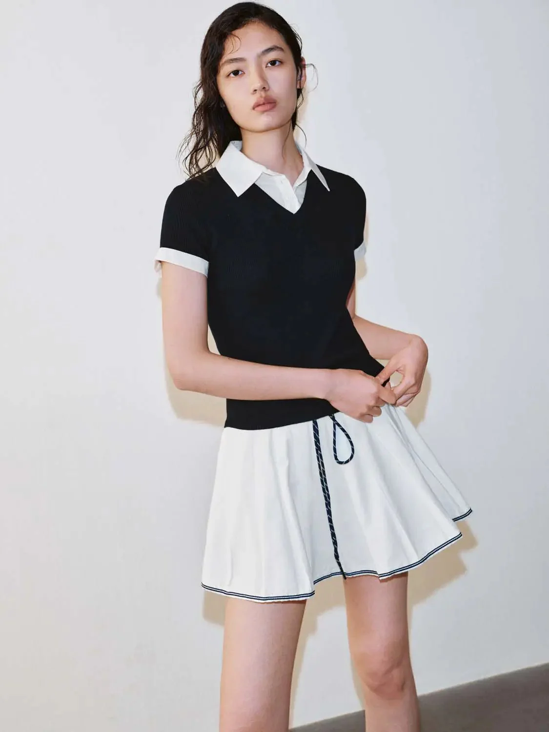 21229-elegant-polo-collar-knit-top-with-cuff-details-t-shirts-2.webp Elegant Polo Collar Knit Top With Cuff Details T-Shirts