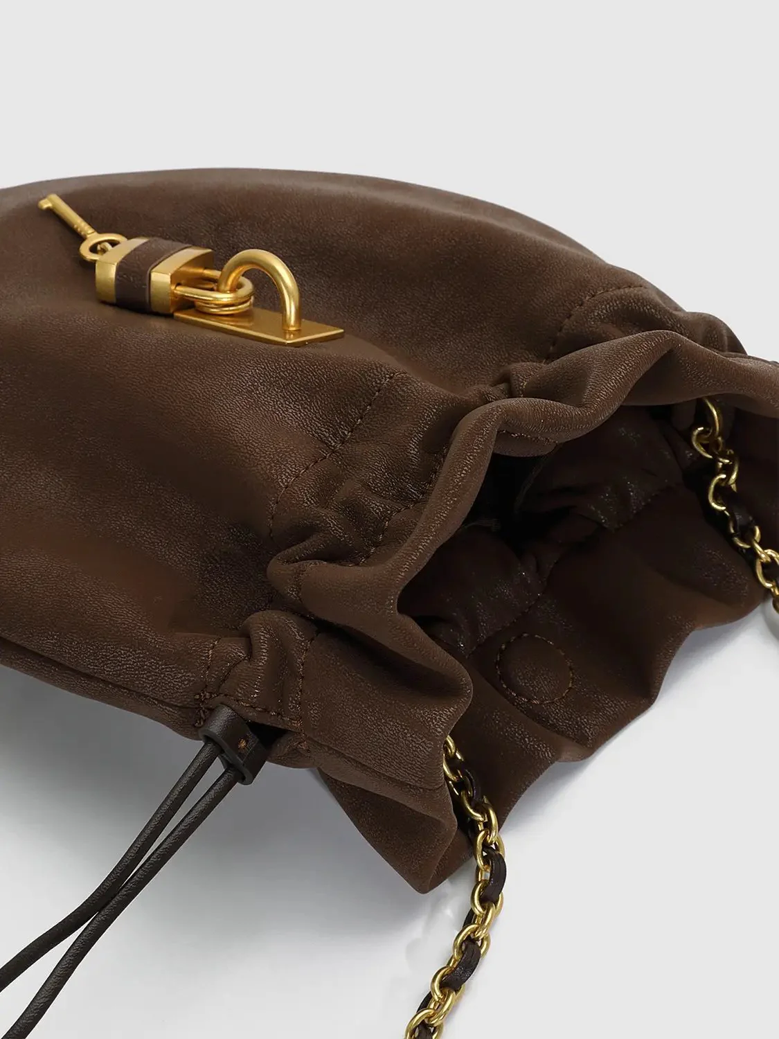 21350-drawstring-fringed-faux-leather-crossbody-mini-bag-5.webp Drawstring Fringed Faux Leather Crossbody Mini Bag
