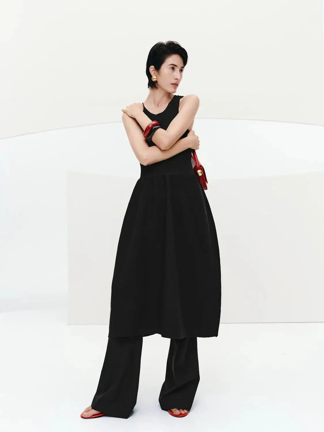 21407-sleeveless-crew-neck-knitted-midi-dresses-4.webp Sleeveless Crew Neck Knitted Midi Dresses
