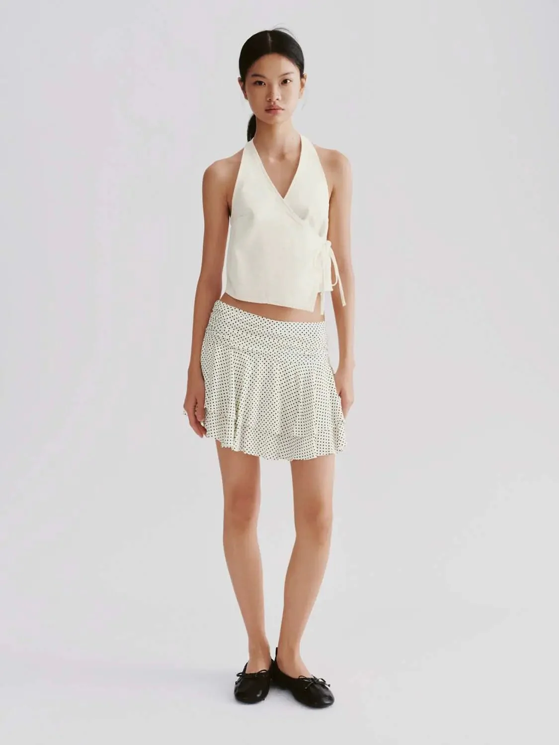 21426-polka-dot-tiered-a-line-mini-skirts-4.webp Polka Dot Tiered A-Line Mini Skirts