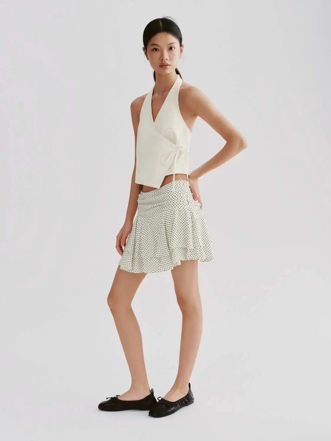 21426-polka-dot-tiered-a-line-mini-skirts-5.webp Polka Dot Tiered A-Line Mini Skirts