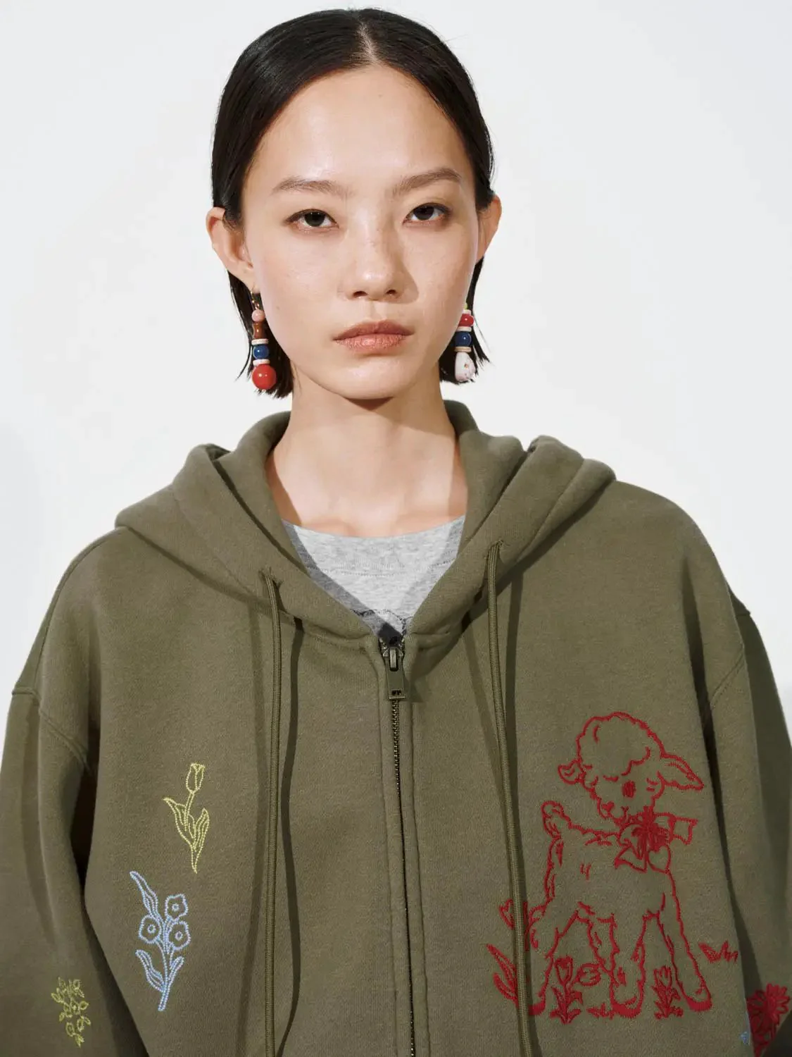 23157-embroidered-drawstring-hooded-loose-fit-jackets-3.webp Embroidered Drawstring Hooded Loose Fit Jackets