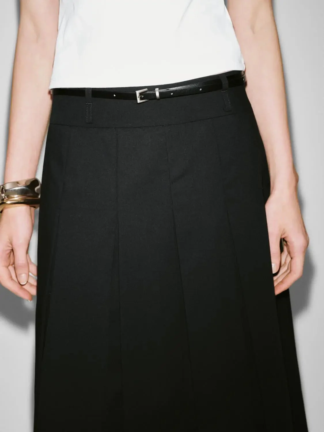 23234-belted-pleated-a-line-mini-skirts-4.webp Belted Pleated A-Line Mini Skirts