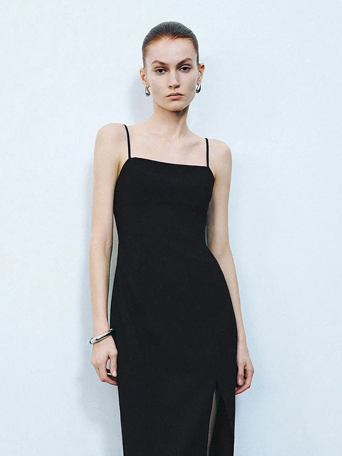 24189-black-spaghetti-strap-midi-sleek-stretch-slit-dress-3.webp Black Spaghetti Strap Midi Sleek Stretch Slit Dress