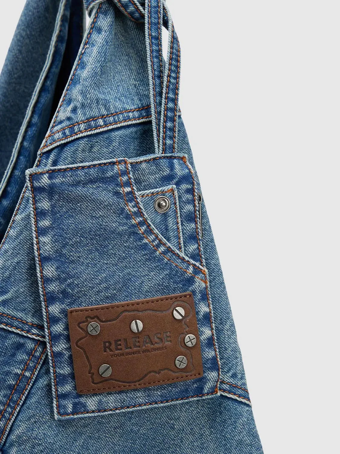 336-denim-shoulder-bag-with-knot-handles-and-patchwork-bag-4.webp Denim Shoulder Bag With Knot Handles And Patchwork Bag