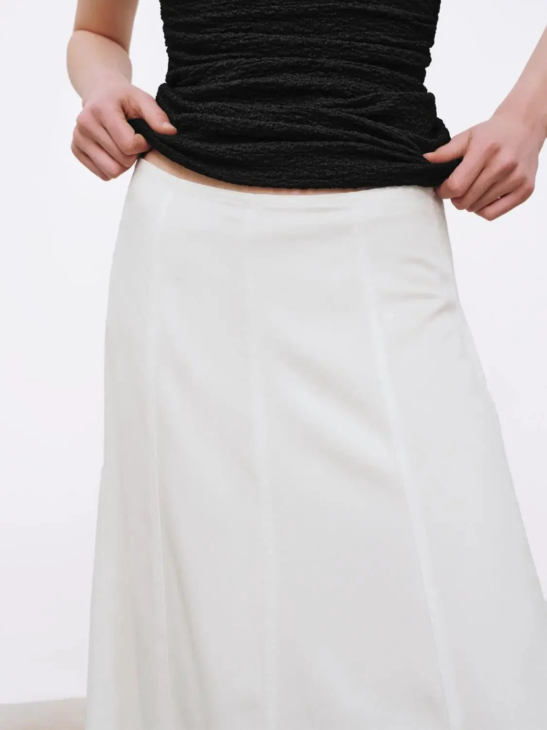 3492-elegant-lightweight-lyocell-seamed-white-midi-skirt-5.webp Elegant Lightweight Lyocell Seamed White Midi Skirt