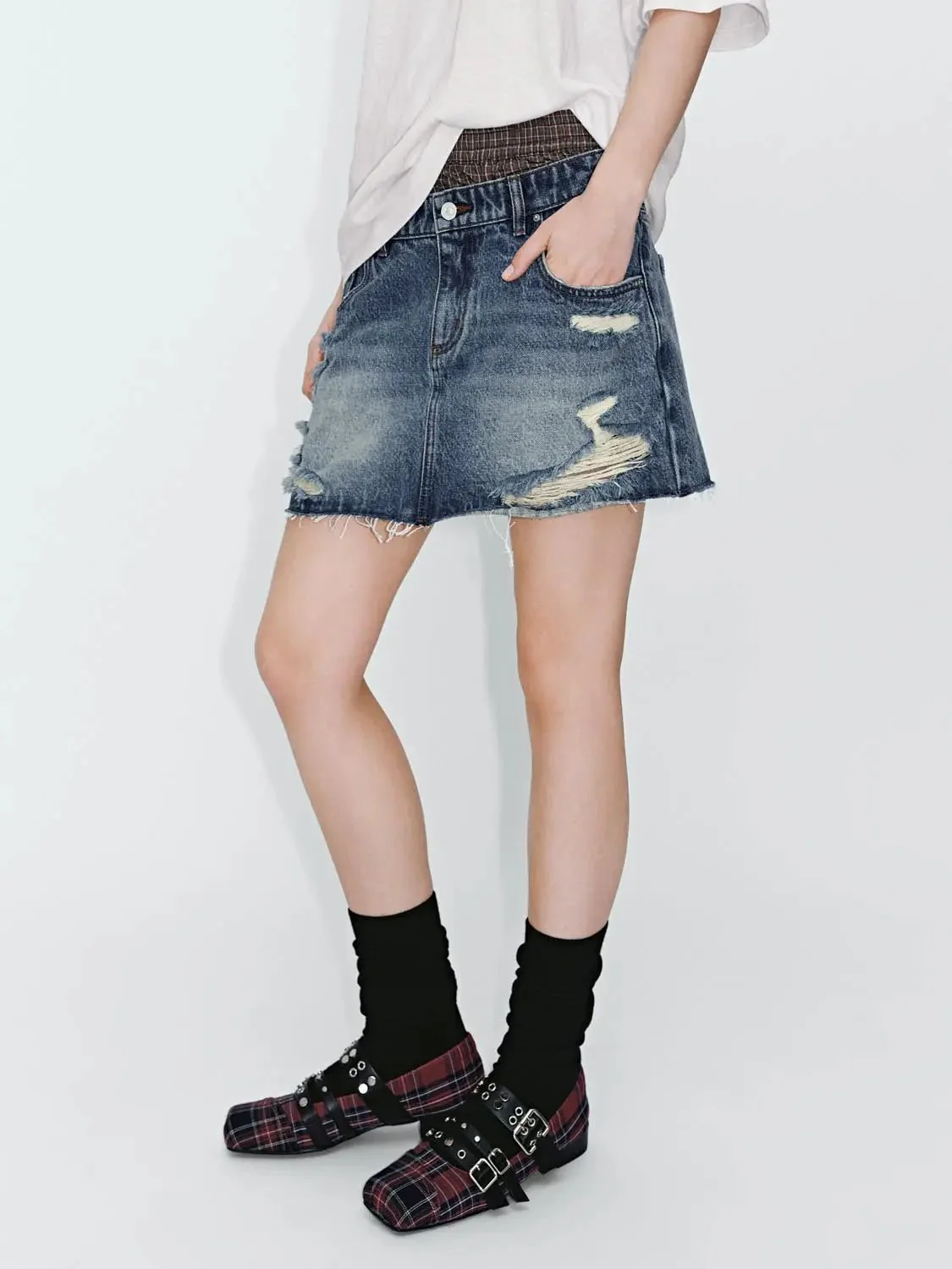3570-distressed-denim-with-contrast-rips-mini-skirt-3.webp Distressed Denim With Contrast Rips Mini Skirt