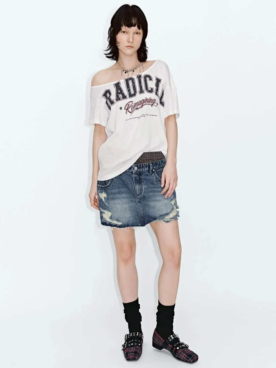3570-distressed-denim-with-contrast-rips-mini-skirt-6.webp Distressed Denim With Contrast Rips Mini Skirt