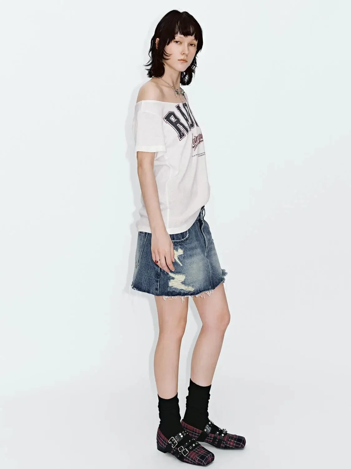 3570-distressed-denim-with-contrast-rips-mini-skirt-7.webp Distressed Denim With Contrast Rips Mini Skirt