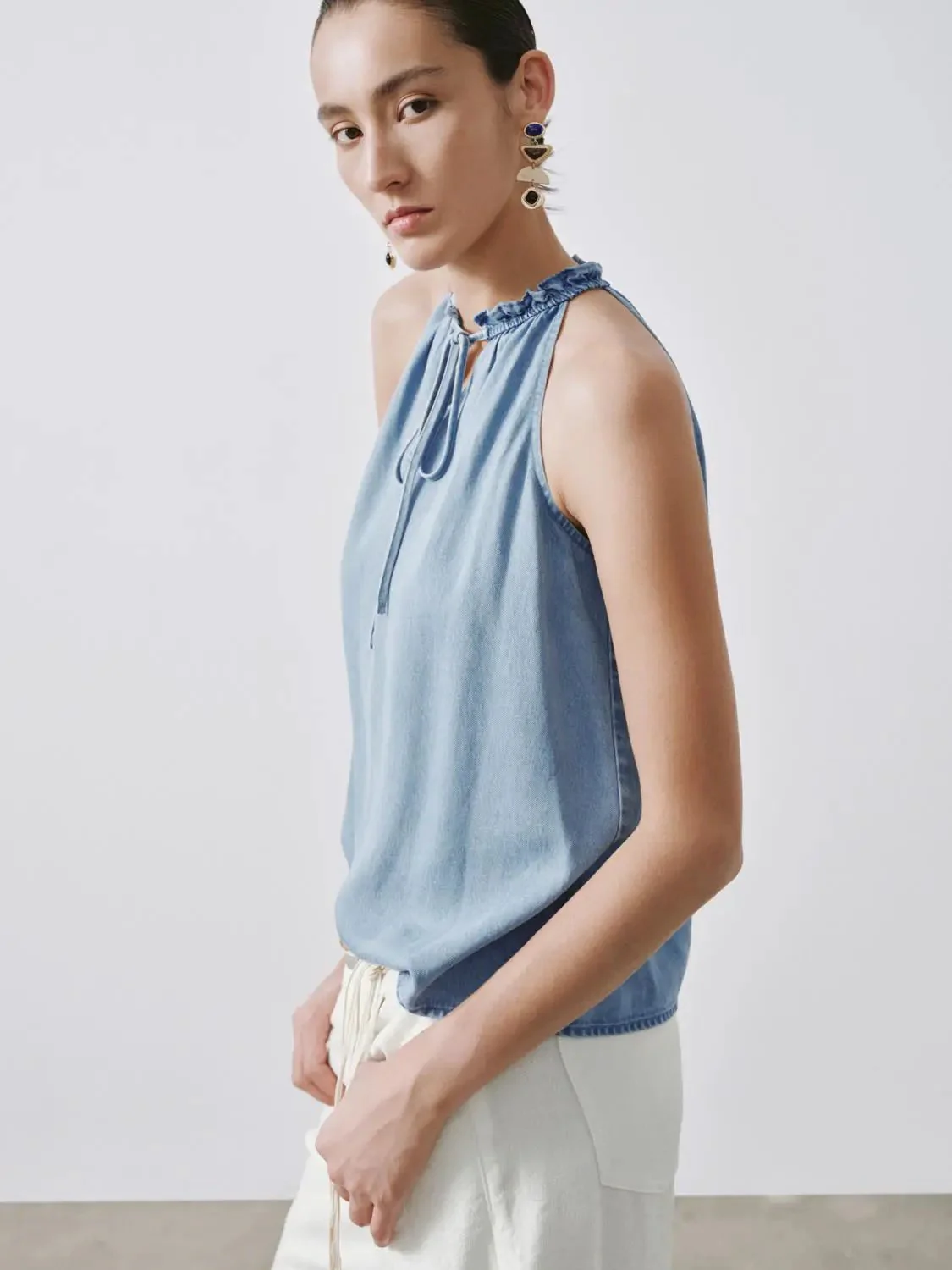 3778-ruffle-neck-sleeveless-denim-shirts-2.webp Ruffle Neck Sleeveless Denim Shirts