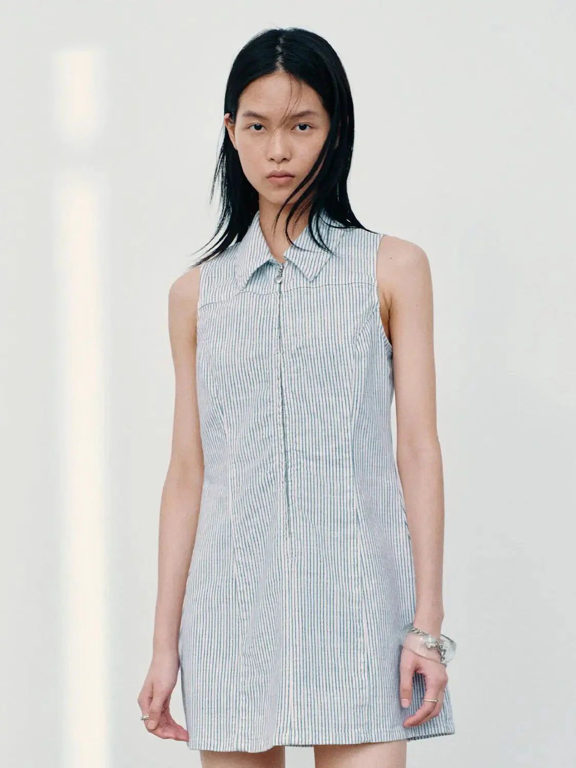 3916-polo-neck-sleeveless-striped-denim-mini-dresses-1.webp Polo Neck Sleeveless Striped Denim Mini Dresses