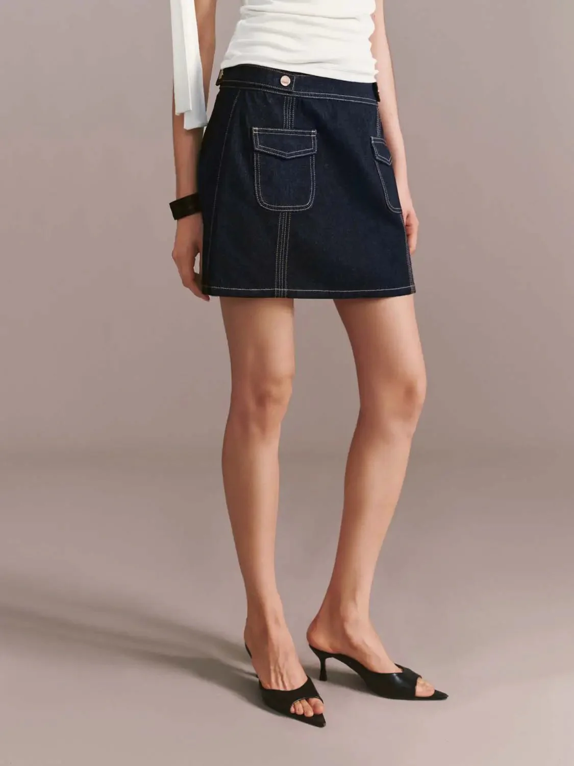 4169-flap-pocket-stitch-detail-denim-mini-skirts-3.webp Flap Pocket Stitch Detail Denim Mini Skirts