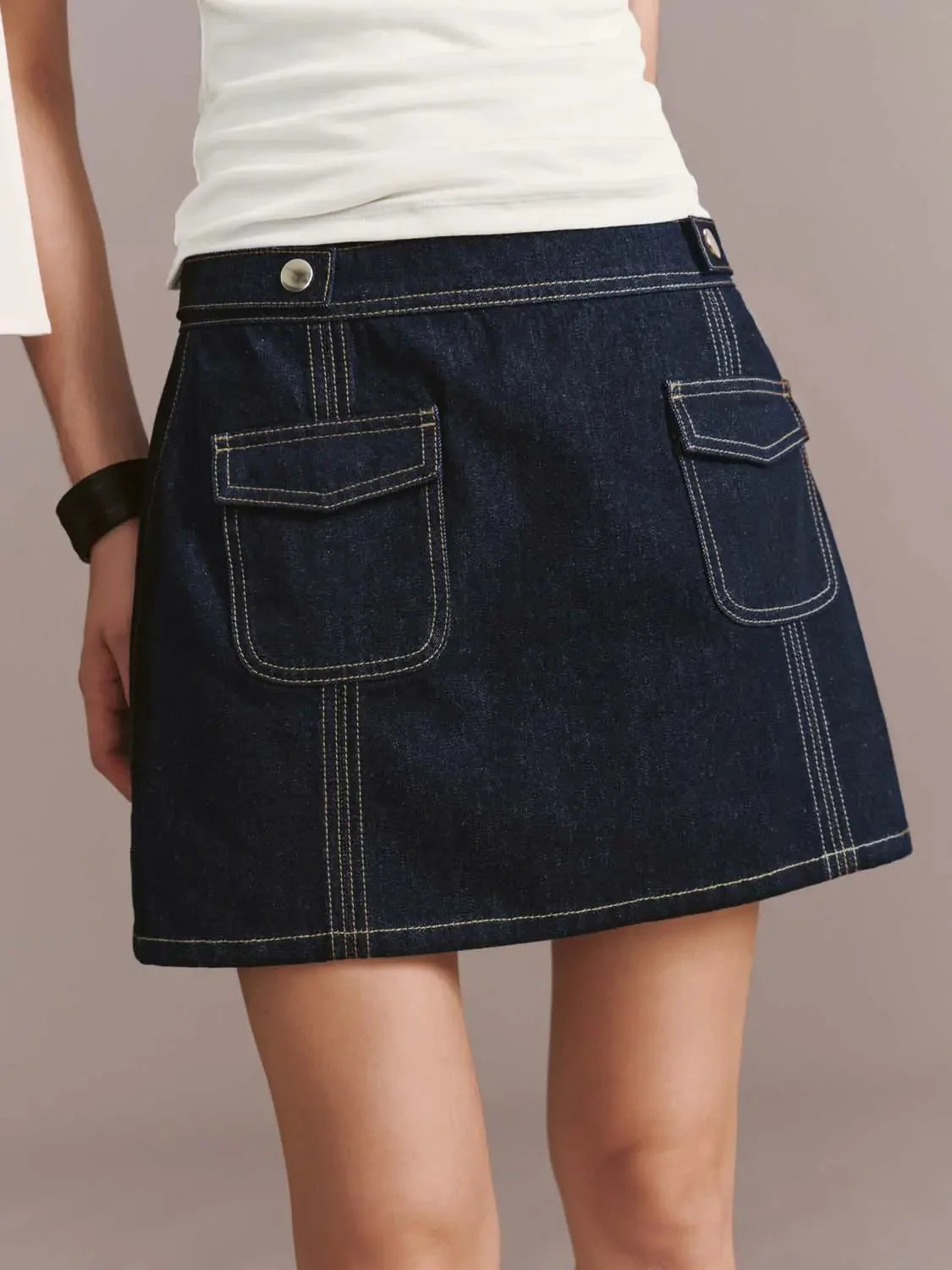 4169-flap-pocket-stitch-detail-denim-mini-skirts-6.webp Flap Pocket Stitch Detail Denim Mini Skirts