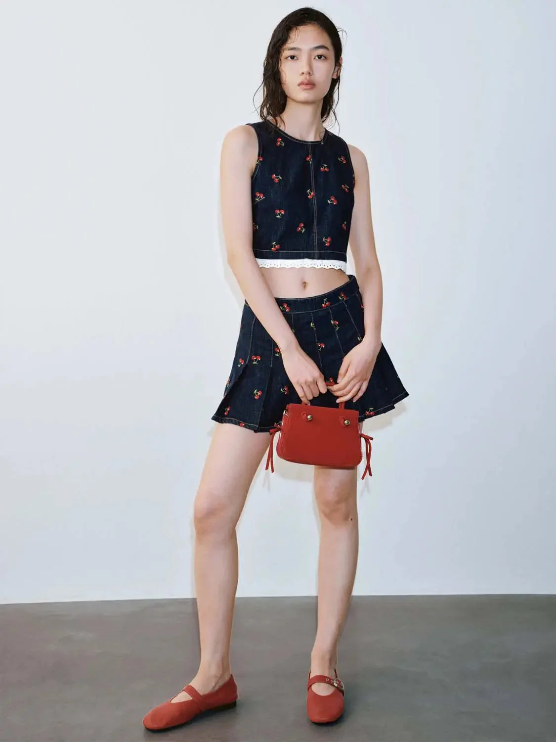 4252-printed-pleated-mini-skirts-4.webp Printed Pleated Mini Skirts