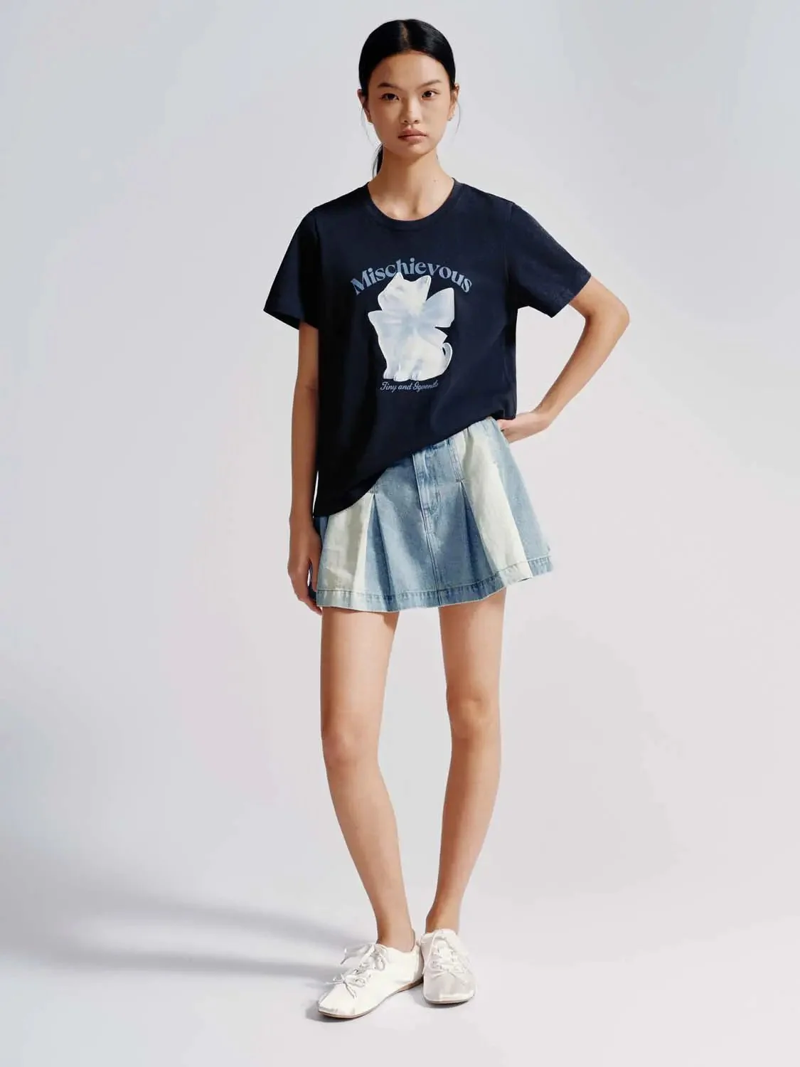 4486-contrast-hem-pleated-mini-denim-skirts-4.webp Contrast Hem Pleated Mini Denim Skirts
