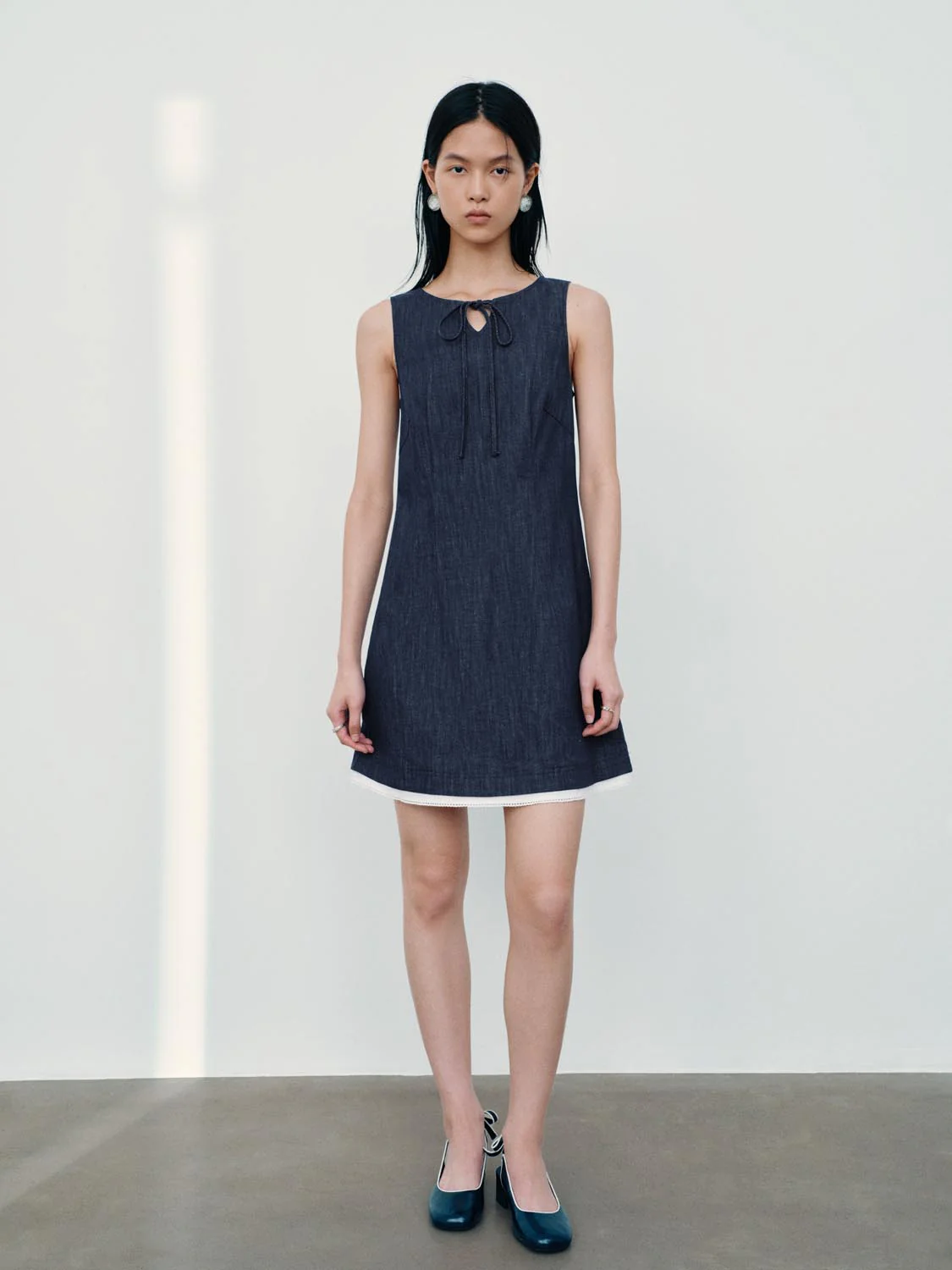 4500-tie-detail-sleeveless-denim-mini-dresses-4.webp Tie Detail Sleeveless Denim Mini Dresses