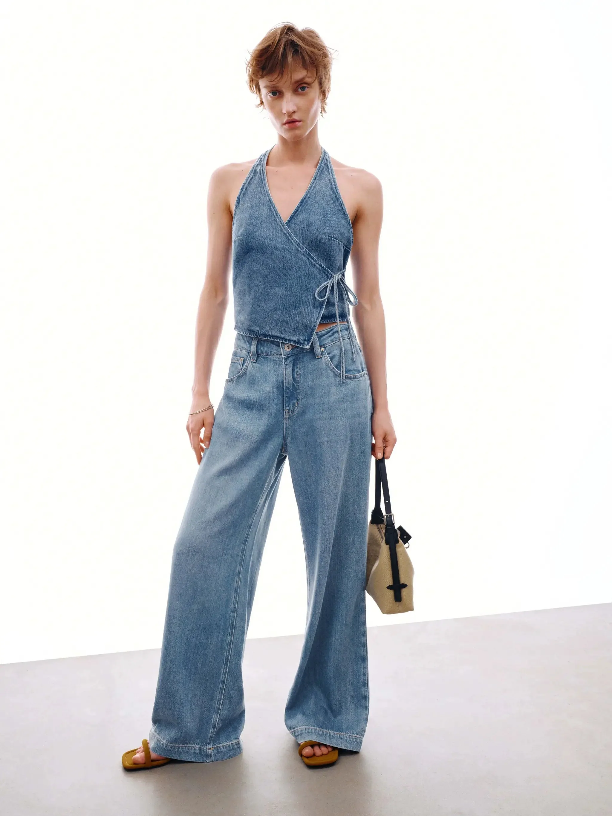 5030-denim-halter-neck-tie-up-sleeveless-shirts-4.webp Denim Halter Neck Tie Up Sleeveless Shirts