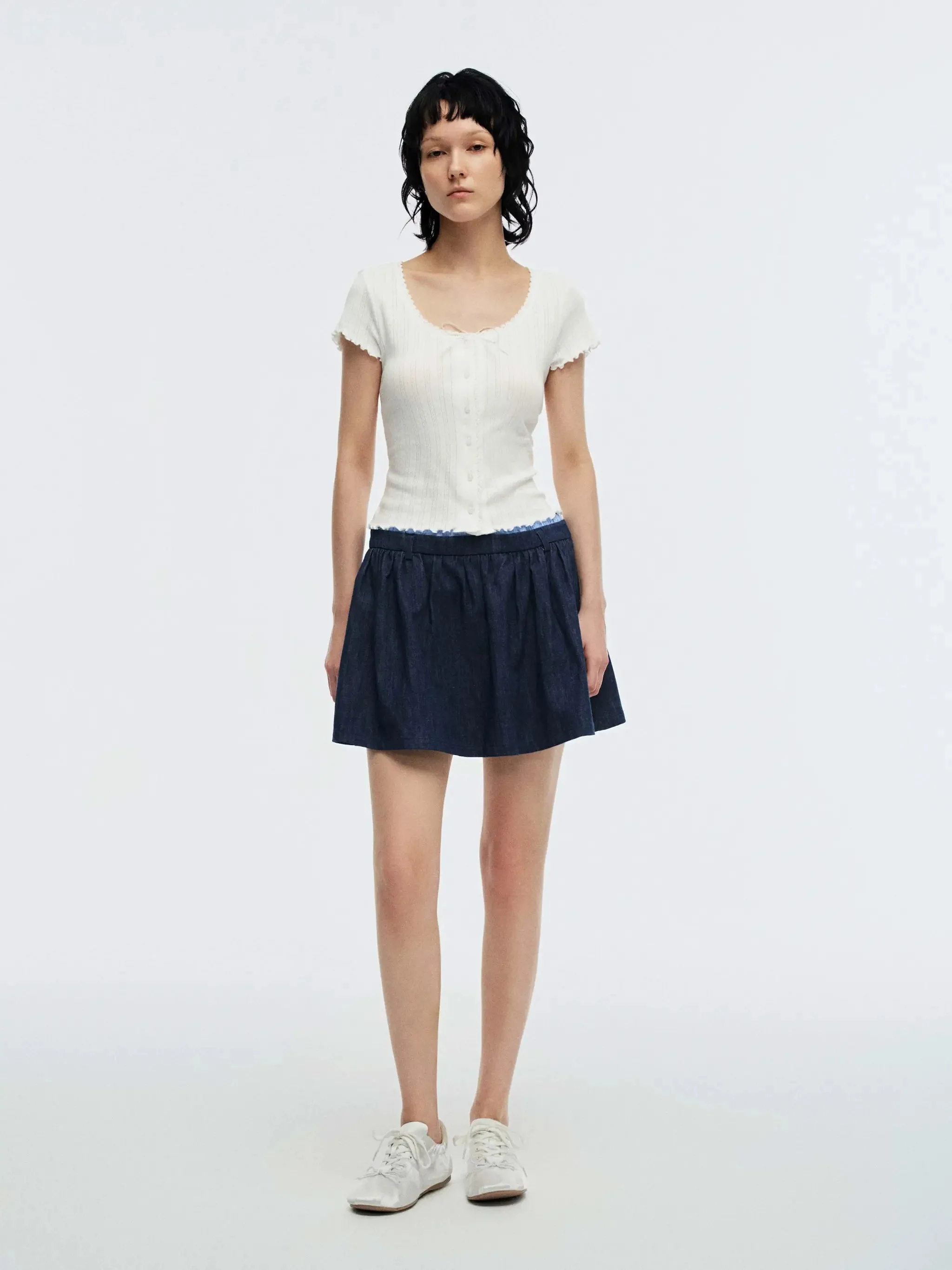 5064-dark-wash-denim-with-subtle-contrast-trim-mini-skirts-4.webp Dark Wash Denim With Subtle Contrast Trim Mini Skirts