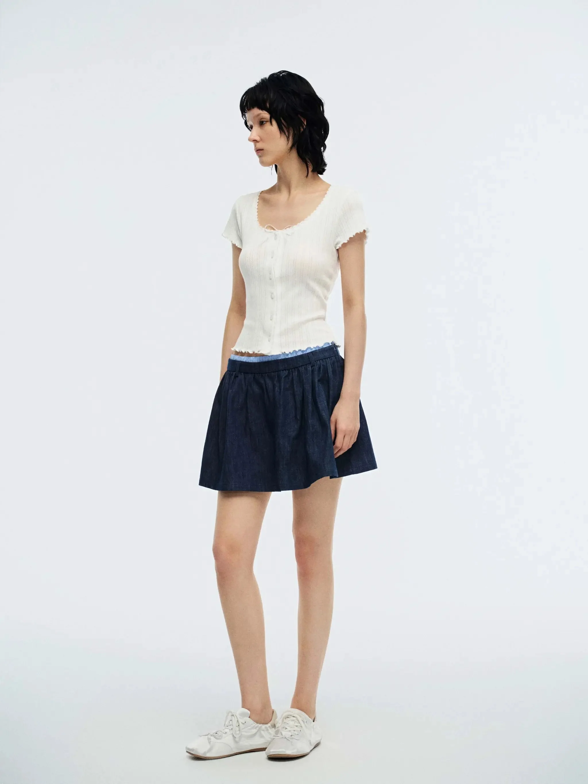 5064-dark-wash-denim-with-subtle-contrast-trim-mini-skirts-5.webp Dark Wash Denim With Subtle Contrast Trim Mini Skirts