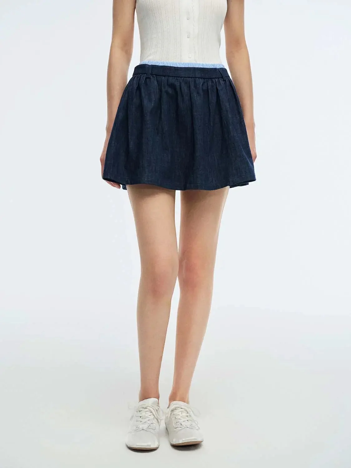 5064-dark-wash-denim-with-subtle-contrast-trim-mini-skirts-9.webp Dark Wash Denim With Subtle Contrast Trim Mini Skirts
