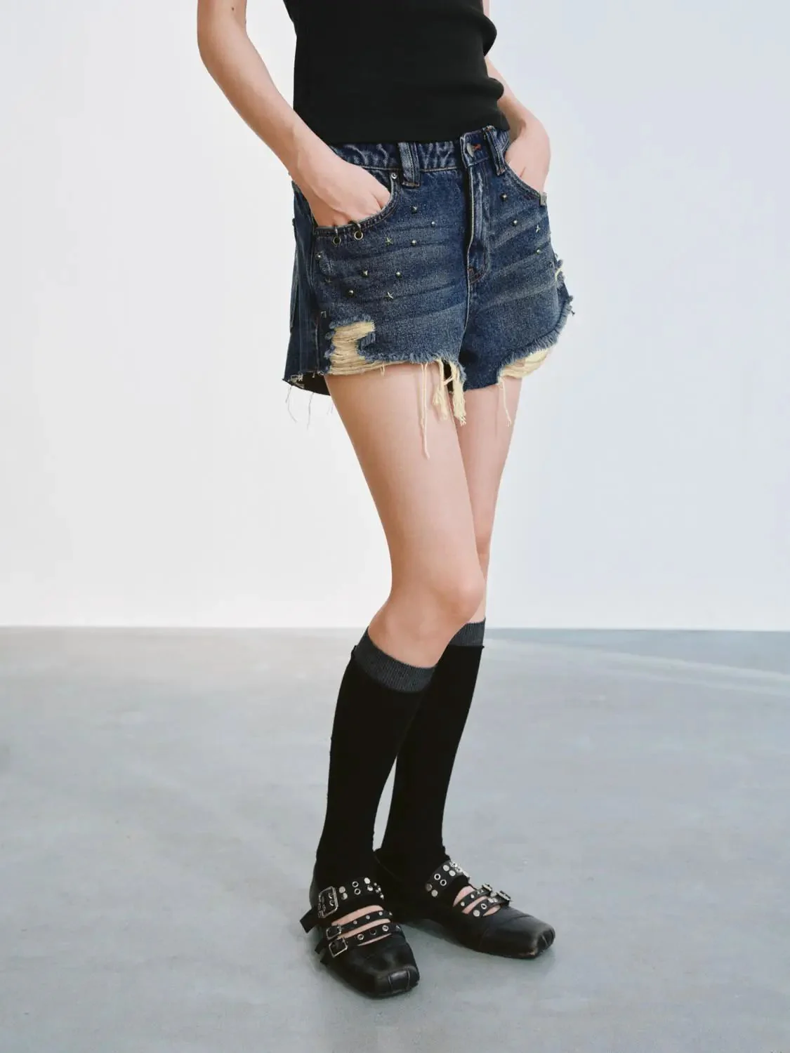 5108-distressed-denim-with-raw-hem-and-studded-detailing-shorts-3.webp Distressed Denim With Raw Hem And Studded Detailing Shorts