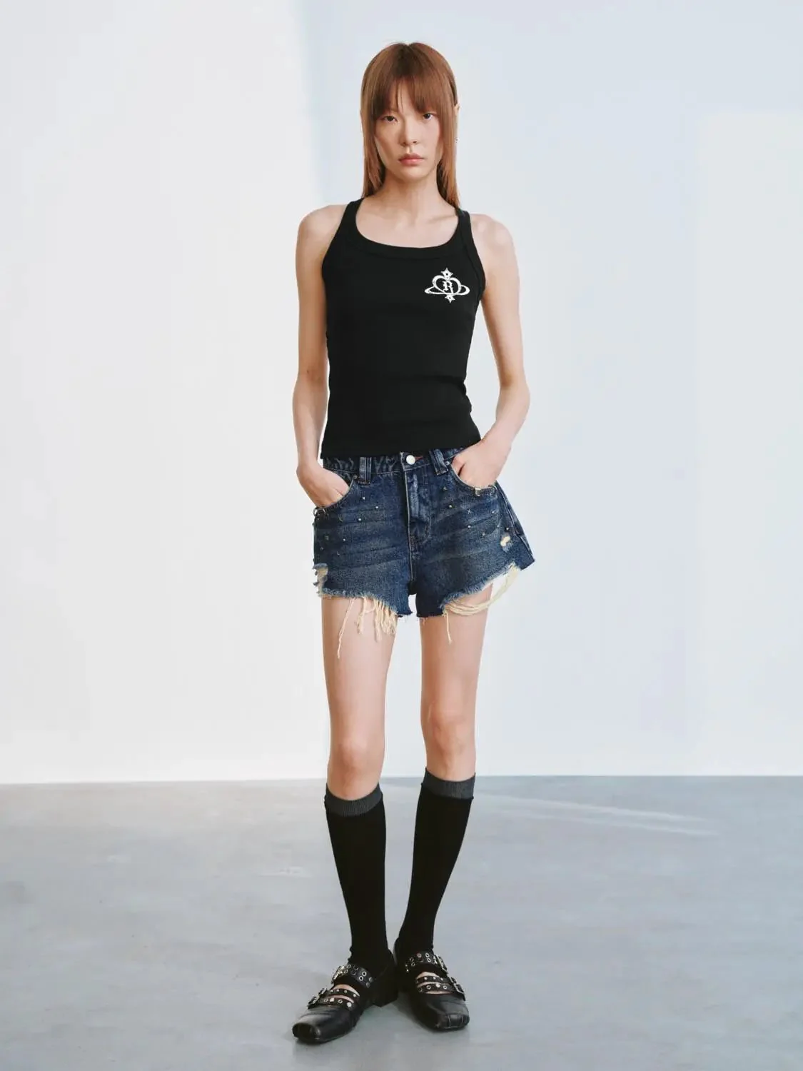 5108-distressed-denim-with-raw-hem-and-studded-detailing-shorts-7.webp Distressed Denim With Raw Hem And Studded Detailing Shorts