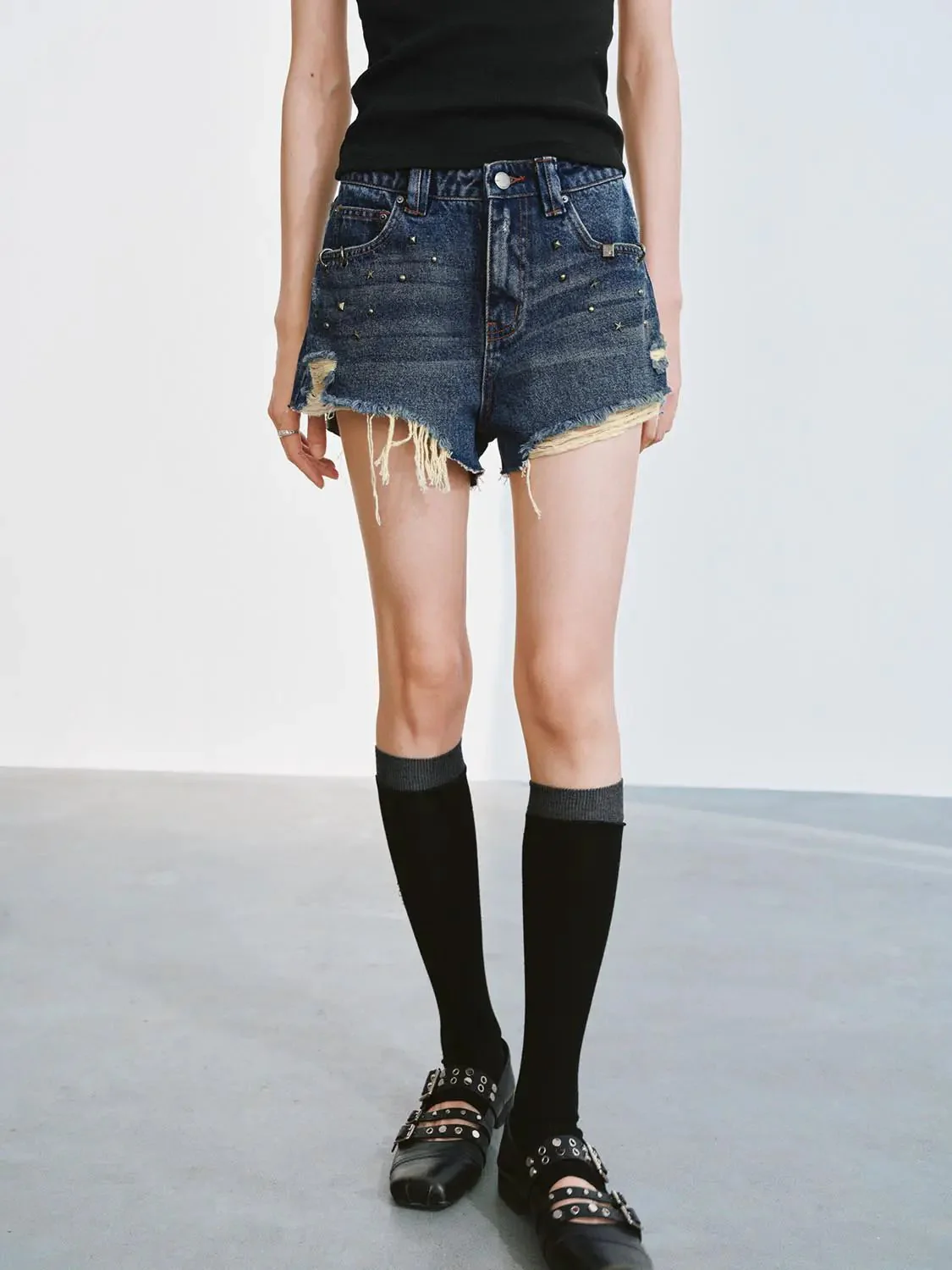 5108-distressed-denim-with-raw-hem-and-studded-detailing-shorts-9.webp Distressed Denim With Raw Hem And Studded Detailing Shorts