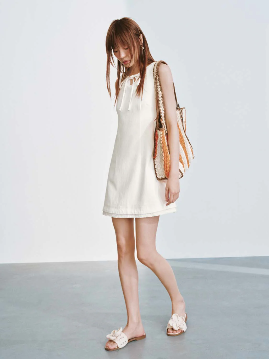 5450-sleeveless-tie-detail-denim-mini-dresses-5.webp Sleeveless Tie Detail Denim Mini Dresses